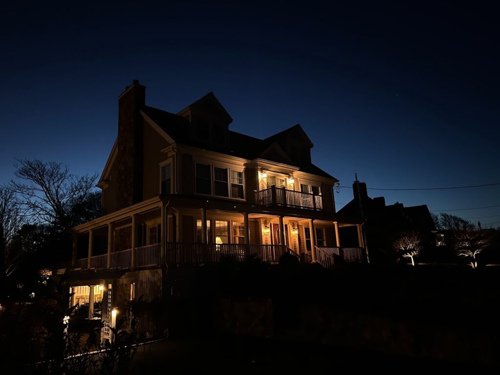 Outdoor lighting looks dim in winter on a residential home