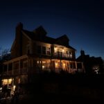 Outdoor lighting looks dim in winter on a residential home